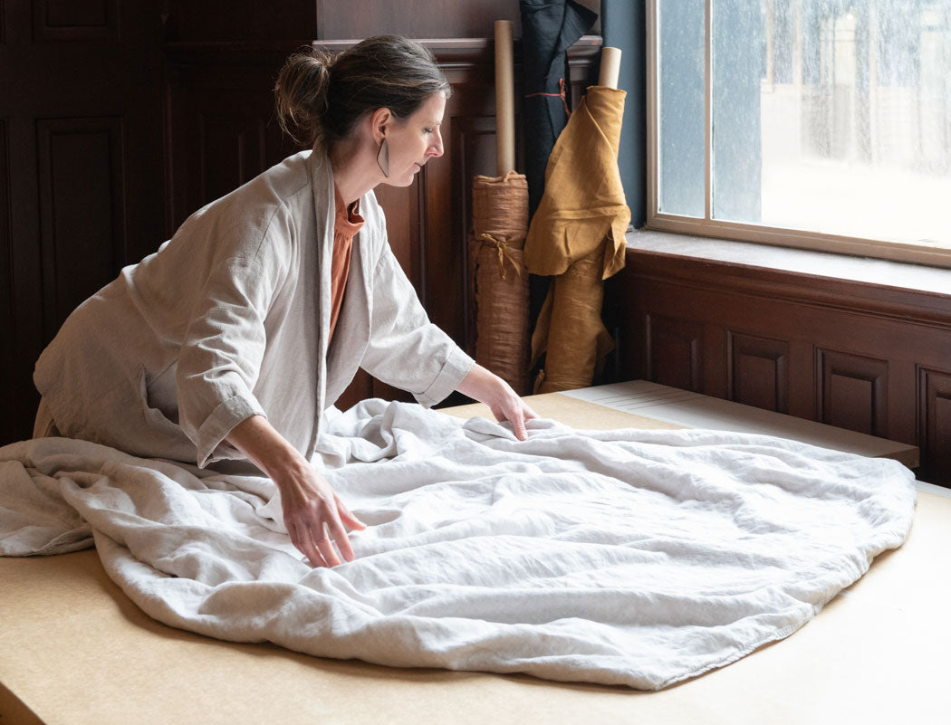 Kristin Magrit working with natural fibres in her studio.